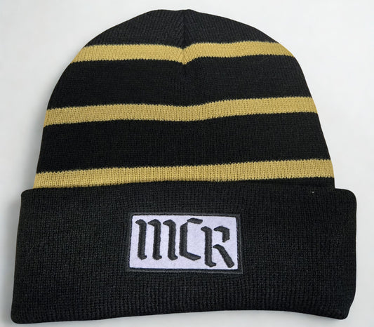 Black beanie with gold stripes and 'MCR' logo on a white background