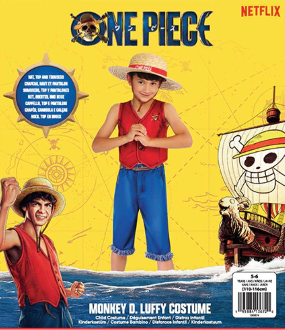 Child wearing a Monkey D. Luffy costume from One Piece with a yellow background and ship illustration. | Iconz