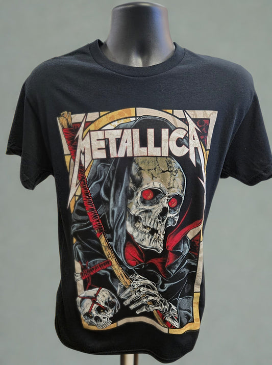 Black t-shirt with Metallica graphic design on a mannequin against a gray background