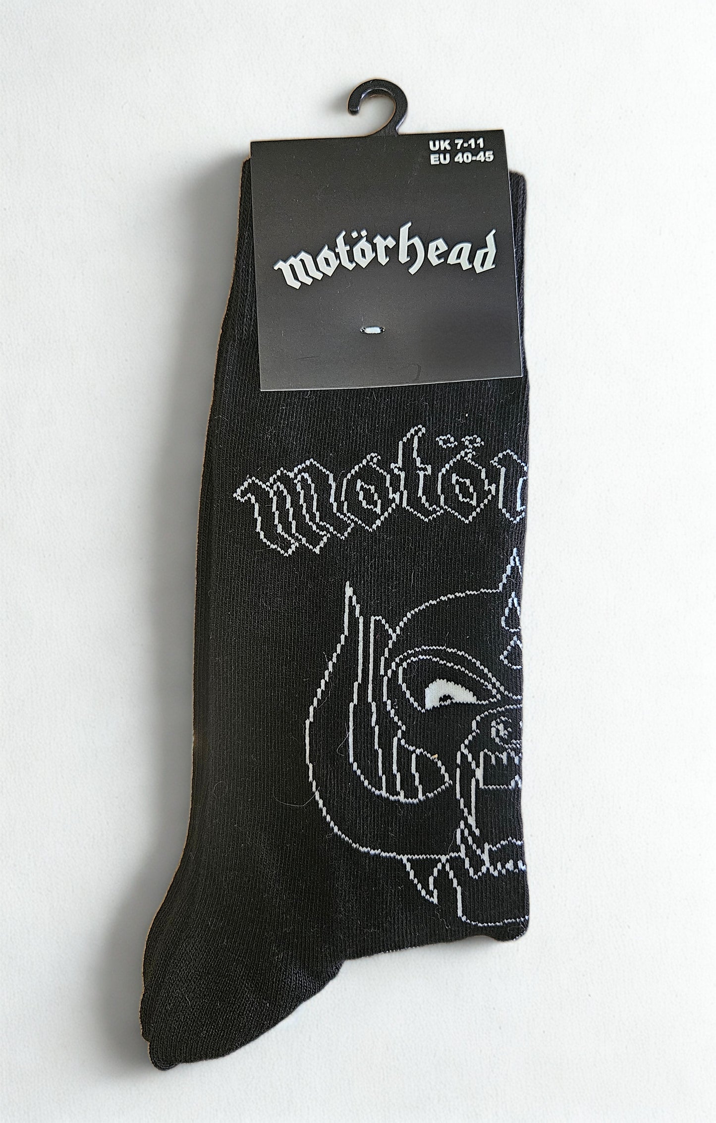 Black sock with white graphics and 'Motörhead' branding on a white background